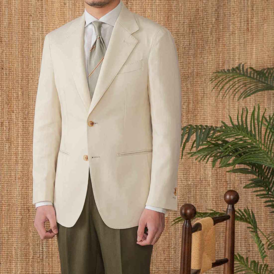Stylish man wearing a light cream cotton jacket